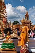 Chiang Mai - Wat Phra That Doi Suthep. The innercourtyard of the temple is filled with Buddha statues and other religious paraphenalia. 